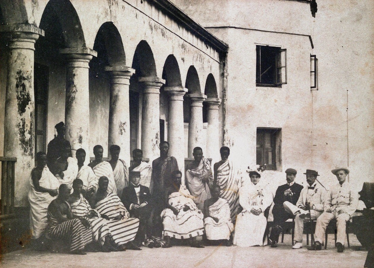 King Prempeh and Court with Dr. de Groot and Mrs. de Groot at Gold Coast Castle by Unknown photographer