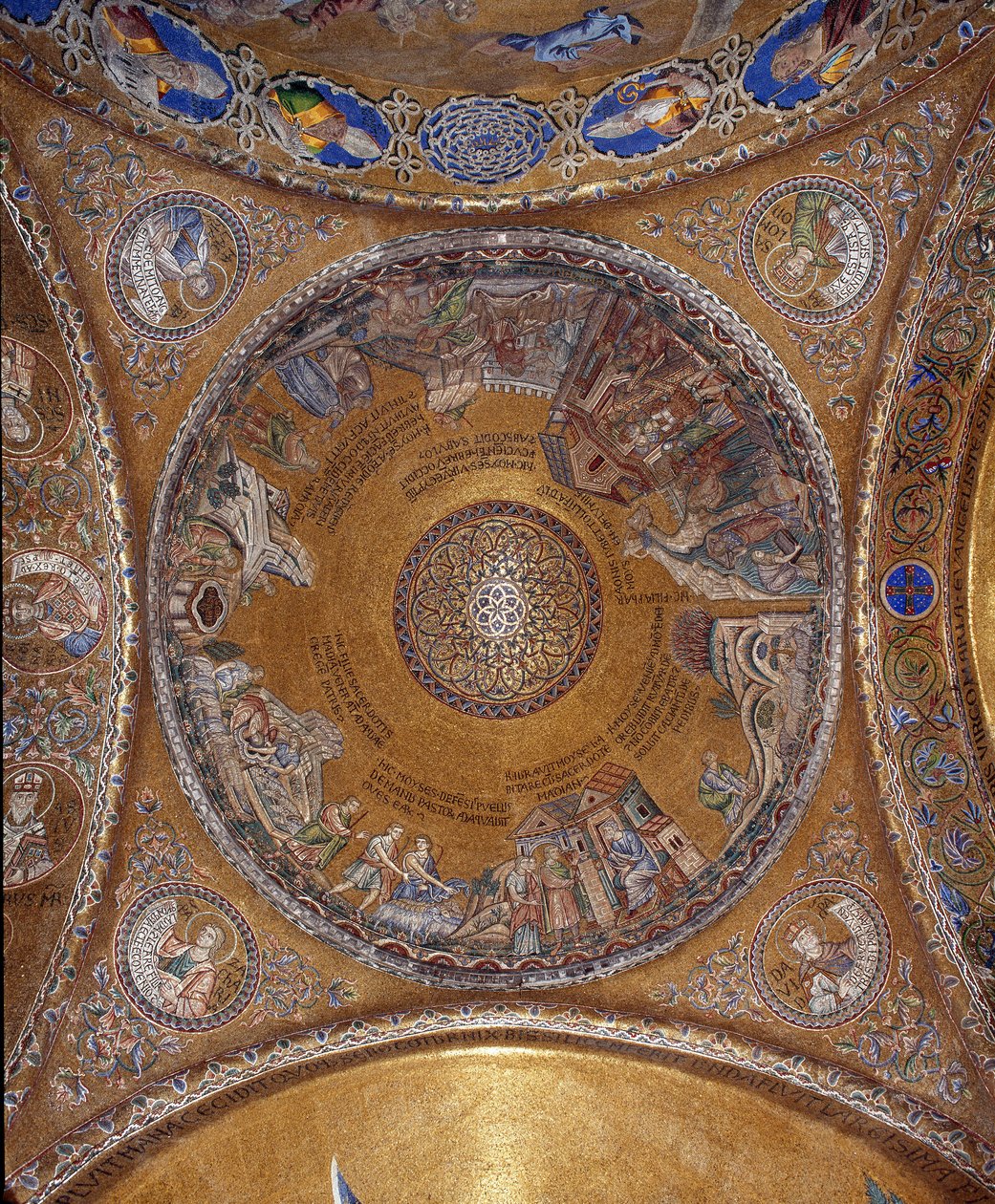 View of the dome with mosaics on a golden background illustrating the life of Moses. In the pendants, the four prophets Solomon, David, Zechariah, Malachi. The beginning of the 13th century. Basilica San Marco by Veneto Byzantine School