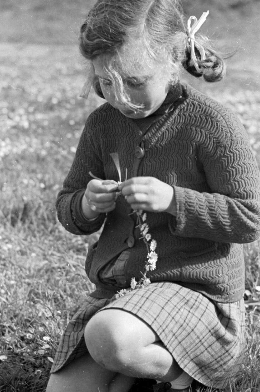 Little Girl Creating a Necklace of Daisies by Vincenzo Balocchi