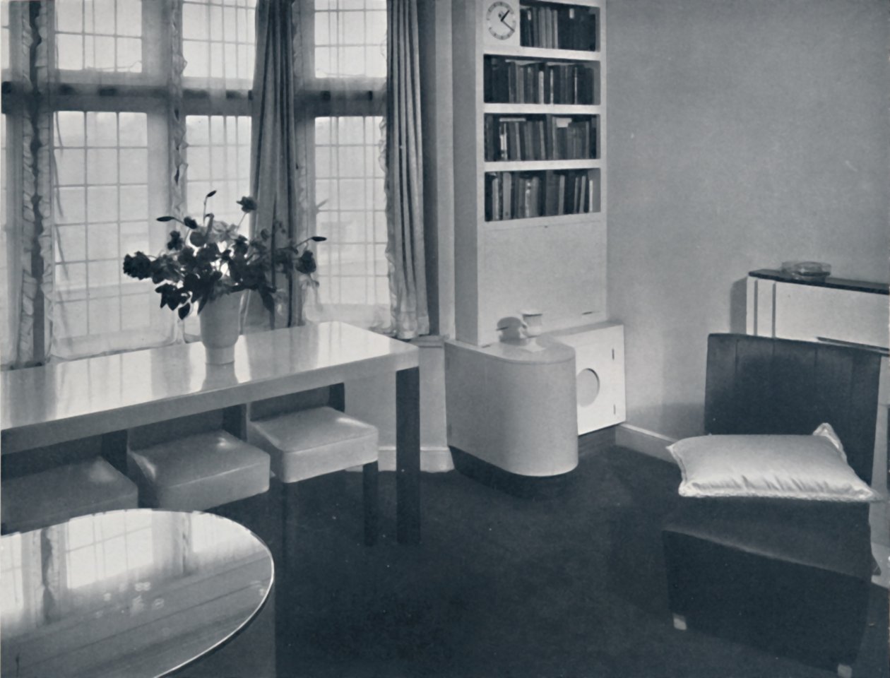 Renovart Ltd: A One-Room Flat with a Useful Corner Fitment Including an Electric Clock by W. Dennis Moss