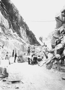 Excavators at work at a marble quarry in the Apuan Alps, Tuscany by A. Corsini