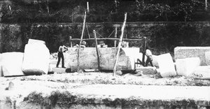 Two machines for squaring off marble at work at a quarry in the Apuan Alps, Tuscany by A. Corsini