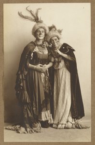 Man and Woman in Costume, Wearing Feathered Hats