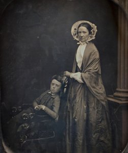 A Woman in Bonnet and Shawl, with her Seated Son