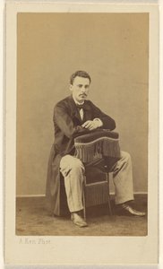 Man with Moustache, Seated, with Front to Back of Fringed Chair