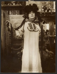 Female Model in a Long White Robe and a Hat with Ribbons, Paris