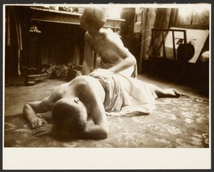 Two Semi-Nude Men on Floor of Studio