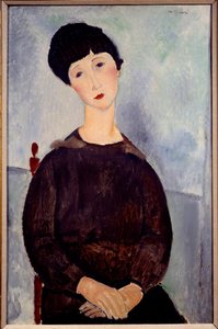 Portrait of a Sitting Brown Girl