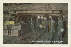 American Coal Mining: Hauling Cars by Electric Motor 1000 ft Below Surface by American Photographer