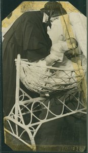 New York Foundling Hospital - Sister Anna Michella with baby and cradle