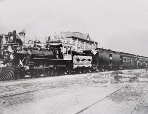 Train with flags by American Photographer
