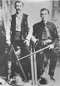 Wells Fargo stagecoach messengers armed with shotguns and Winchester repeating rifles