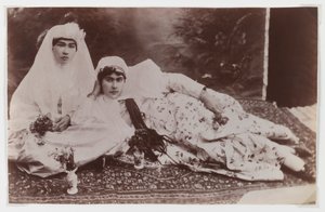 Women posing with bouquets