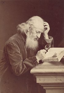 Bearded Man with Magnifying Glass Examining a Manuscript