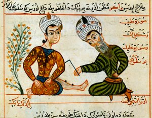 Cauterisation of a wound. Miniature from a milking of Arab medicine. 15th century Paris, B.N.