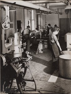 Six Men Working in a Welding Workshop