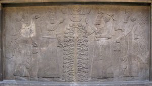 Relief with Two Figures of Ashurnasirpal, Winged Mythological Beings and the God Ashur, Before the Tree of Life, 885-860 BC by Assyrian