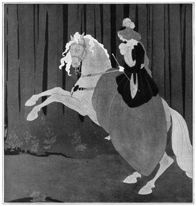 A woman sitting on a rearing horse