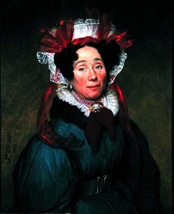 Portrait of a lady with a red and white bonnet