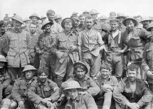 A group of the 46th Australian Infantry Battalion just after coming out of the line in front of Monument Wood, showing the condition of the