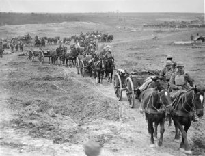 Limbers of the 6th Brigade of Australian Field Artillery bringing up ammunition to the guns through the Hindenburg Line near Bellicourt, 4 October 1918