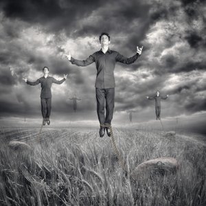Levitating Men Stormy Sky
