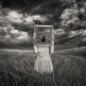 Woman With Framed Raven by Baden Bowen