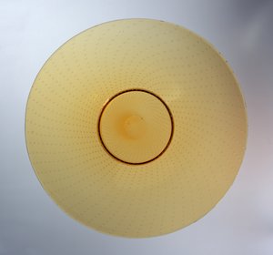 Dish in amber with enclosed bubble pattern, manufactured by James Powell & Sons, c.1938