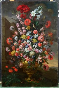 Lilies, Tulips, Carnations, Peonies, Convolvuli and Other Flowers in a Bronze Urn with Birds, a Tortoise and Butterflies in a Landscape by Bartolomeo Bimbi