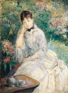 Young Woman Seated on a Sofa