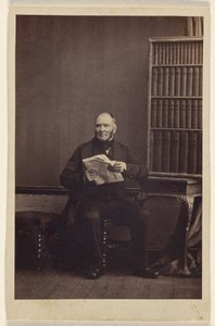 Unidentified Man Seated, Holding a Newspaper