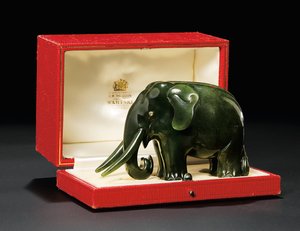A jewelled nephrite model of an elephant, with diamond-set eyes, c.1900 by Carl Fabergé