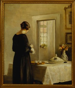 An Interior with a Woman at a Table