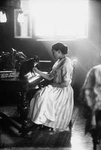 Portrait of Wanda Sitting at a Table with Her Cat, Trieste