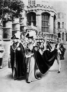 King George V and Queen Mary in the Robes of the Knights of the Garter, Windsor by Central Press