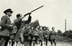 RAF personnel learning to fire guns during the Second World War by Charles Brown