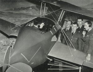 RAF personnel learning to fly in a flight simulator during the Second World War by Charles Brown