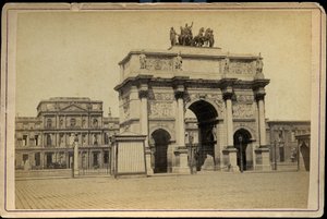 The Arc de Triomphe du Carrousel with the buildings in ruins of the Tuileries imperiales