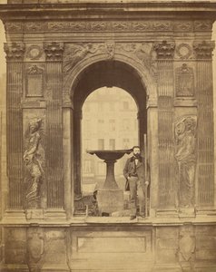 [Unidentified Man Posed in Fontaine des Innocents] by Charles Marville