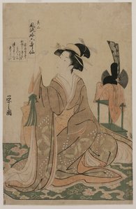 Young Woman Kneeling by a Stand with a Ceremonial Cap