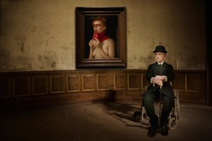 Man Views Nude Portrait