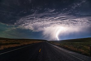 Lightning Strikes Open Road by Chuanxu Ren