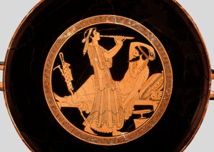 Banquet and double flute player (Detail from kylix or Attic red-figure cup, c.490 BC)