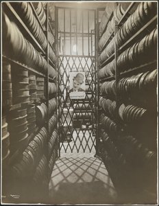 Film storage room at the Mutual Film Co. with poster of Charlie Chaplin, New York by Company Byron