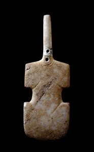 Statuette in the form of violin. Marble idol from Paros. 3000 BC. Cycladic Civilization. Athens, National Archaeological Museum