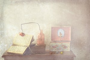 Faded Book and Music Box by Delphine Devos