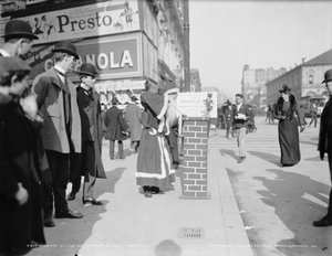 Santa Claus collecting donations for Volunteers of America on Broadway in New York City, c. 1903