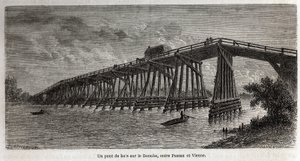 A wooden bridge over the Danube, between Passau and Vienna. Engraving in Le tour du monde, edited by Edouard Charton by Dieudonne Auguste Lancelot