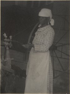 Woman at Spinning Wheel