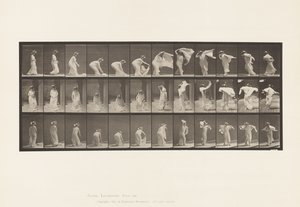Plate 233. Lifting Shawl, Putting Around Shoulders, Turning by Eadweard Muybridge